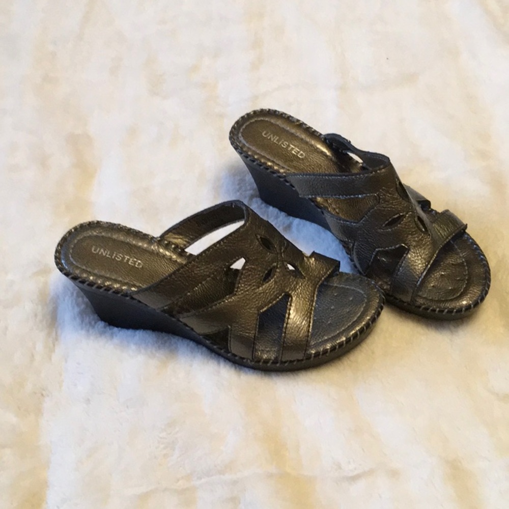 Unlisted wedge sandal.
